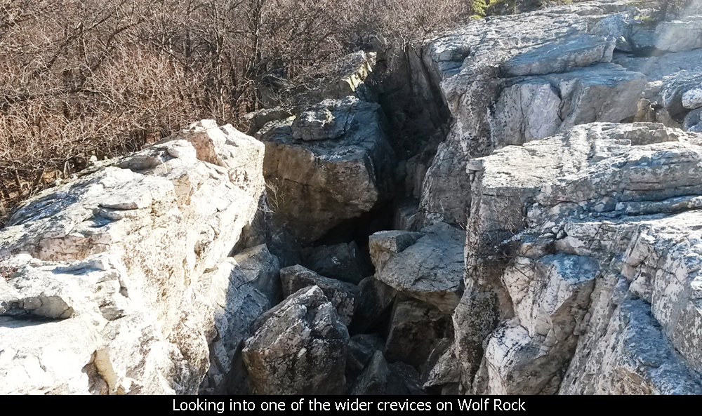 Looking into one of the wider crevices on Wolf Rock