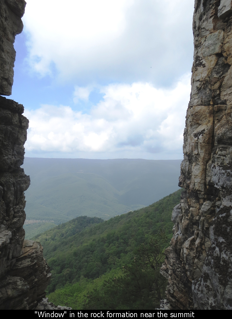 Window in the rock formation near the summit
