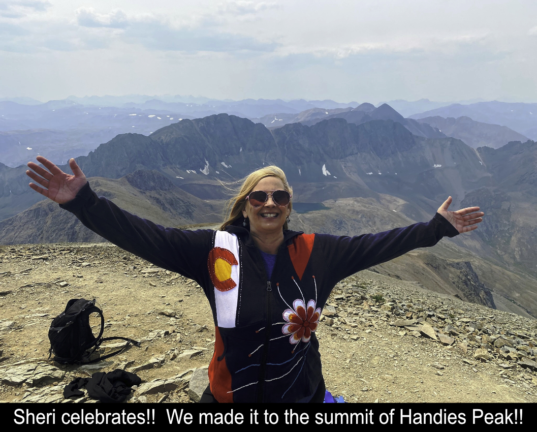 Sheri Celebrates On Summit Of Handies